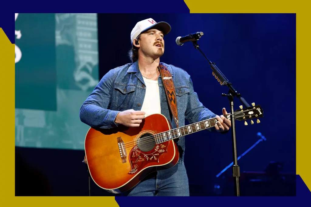 Aksi panggung musisi country legendaris Morgan Wallen saat menyapa para penggemarnya di konser musik.